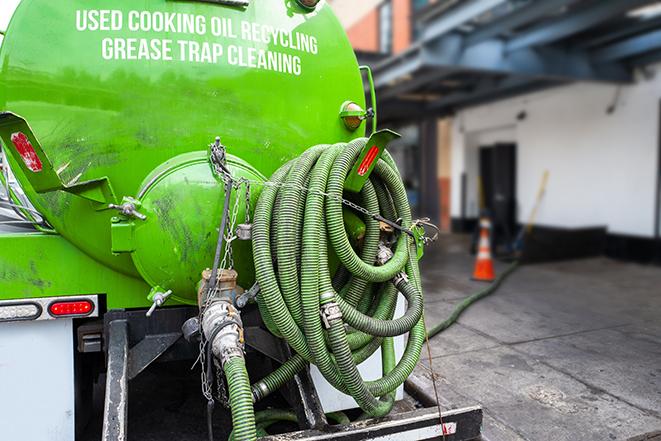 septic tank pump truck in operation in Dunellen, NJ